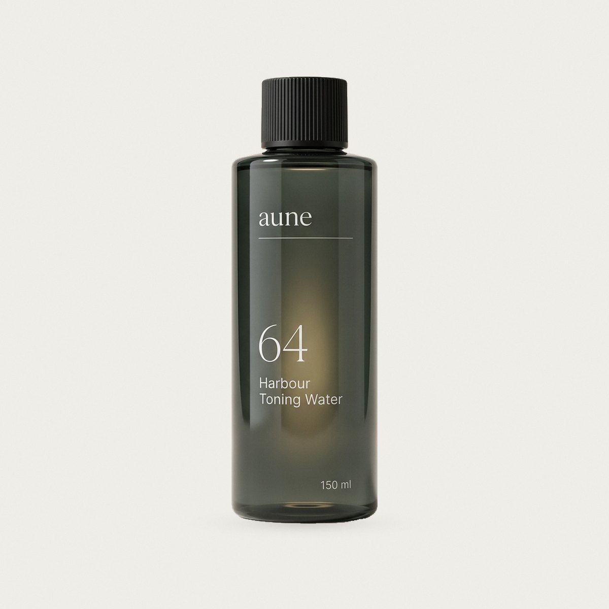 Harbour Toning Water in a smoked glass bottle, on a warm white backdrop